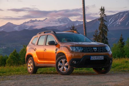 Photo for Dacia Duster SUV in mountainous terrain - Royalty Free Image