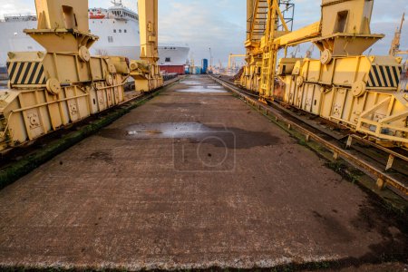 Photo for The quay of the ship repair yard including cranes - Royalty Free Image