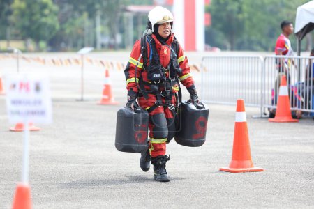 Photo for Terengganu September 14, 2023. The Competence Skills Competition for firefighters was held in Terengganu.  Terengganu September 14, 2023. The Competence Skills Competition for firefighters was held in Terengganu. - Royalty Free Image