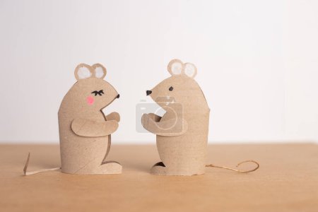 Photo for Two mice made out of recycled toilet paper roll, conceptual art, tiny rats, brown paper, simple primitive tube shape toy, educational and craft activity, - Royalty Free Image