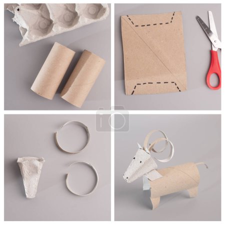 Toilet paper roll crafted into a ram with curled horns on plain surface, promoting recycling and easy kids craft, animal-themed and educational, DIY, tutorial. grey background