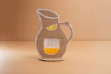 easy activity to do, lemonade pitcher paper craft for kid and kindergarten, DIY, art project from recycled materials, beige background, front view
