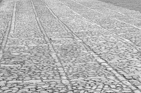 Detalle de pavimento de piedra en el pueblo de Santillana del Mar, Cantabria, norte de España