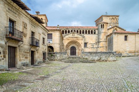 View of the Collegiate church and cloister of Santa Juliana in the town of Santillana del Mar, Cantabria, northern Spain, built in the 12th century, in Romanesque style
