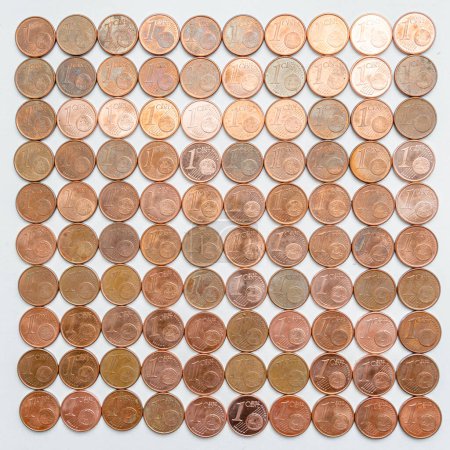 Several one euro cent coins on white background