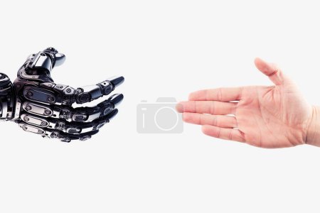 Robot hand reaches out to the human hand. Handshake of a cyborg and a man. Technology concept. Friendship between a robot and a human tote bag #645246472