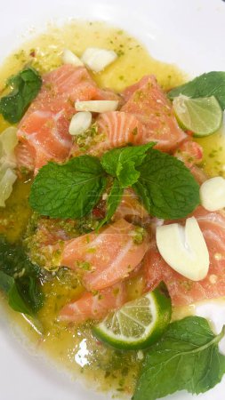 Jeh O Chula michelin star restaurant in Bangkok Thailand famous salmon yum or salmon yam