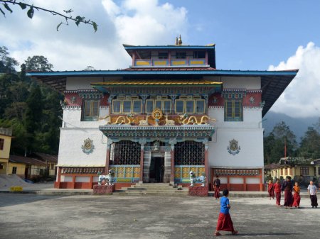 Photo for Monk kids playing at Phudong Monastery premises look mesmerizing in North Sikkim, India. This is one of the oldest and most important Buddhist monasteries in Sikkim which former king Gyurmed Namgyal built in the 18th Century. - Royalty Free Image