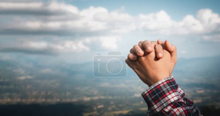 Téléchargez les photos : Banner with copy space of woman hands praying to god on nature background. Panorama of female person worship with faith and love. Concept of Religion, Christianity, faith, peace, hope - en image libre de droit