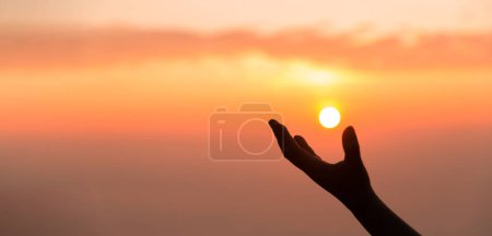 Photo for Silhouette of woman hand praying spirituality and religion, banner and copy space of female worship to god. Christianity religion concept. Christians person are pray humility humble to god. - Royalty Free Image
