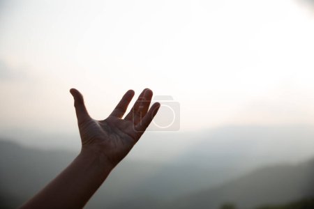 Photo for Human hands open palm up worship. Eucharist Therapy Bless God Helping Repent Catholic Easter Lent Mind Pray. Christian Religion concept background. fighting and victory for god - Royalty Free Image