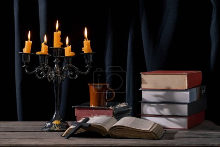 Photo for Still Life with Vintage Book and Wooden Cross: Capturing the Essence of Religious Traditions. Antique Bible and Old Book on Rustic Wooden Table: Exploring Heritage and Knowledge. - Royalty Free Image
