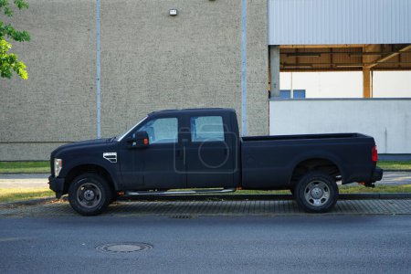 Photo for A gray Ford F-350 in a parking space by the road. Berlin, Germany - Royalty Free Image
