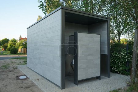 Photo for Public toilet on the street in the recreation area of Berliners. Berlin, Germany - Royalty Free Image
