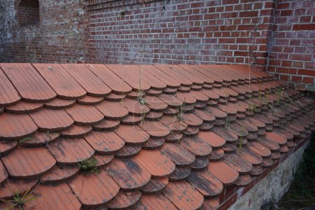 Photo for Tiled roof on historical buildings in the Spandau Citadel. The Spandau Citadel, German: Zitadelle Spandau, is a fortress in Berlin, Germany. - Royalty Free Image