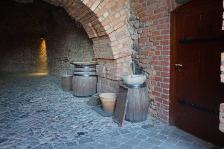 Photo for Wooden barrels, flower pots and other household items in the Spandau Citadel. The Spandau Citadel, German: Zitadelle Spandau, is a fortress in Berlin, Germany. - Royalty Free Image