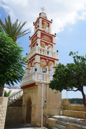The bell tower of the Holy Temple of Agios Taxiarchis is located in Lardos, Rhodes Island, South Aegean region, Greece