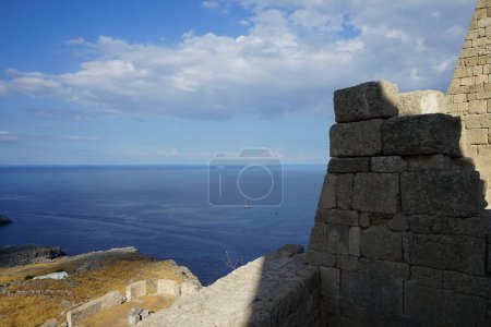 View of the Mediterranean Sea from the ancient Acropolis of Lindos. An acropolis was the settlement of an upper part of an ancient Greek city. Lindos, Rhodes Island, Dodecanese, Greece