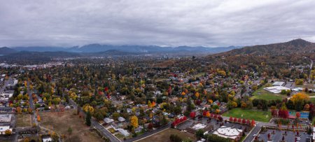 Photo for Aerial view of Grants Pass Oregon with trees in fall colors. - Royalty Free Image