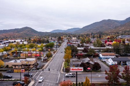 Photo for November 5, 2022, Grants Pass, Oregon. Les Schwab and Autozone in Grants Pass Oregon. Drone shot. - Royalty Free Image