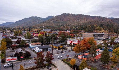Photo for November 5, 2022, Grants Pass, Oregon. Auto Zone and other businesses in town, aerial photo. - Royalty Free Image