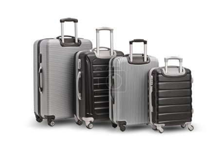 Téléchargez les photos : Plan studio de valises argentées et noires avec roues isolées sur fond blanc - en image libre de droit