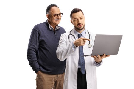Photo for Young male doctor showing a laptop computer to a mature man isolated on white background - Royalty Free Image