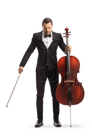 Photo for Full length portrait of a musician holding a cello and bowing isolated on white background - Royalty Free Image
