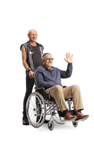 Photo for Punk with a mature man in a wheelchair sitting and waving isolated on white background - Royalty Free Image