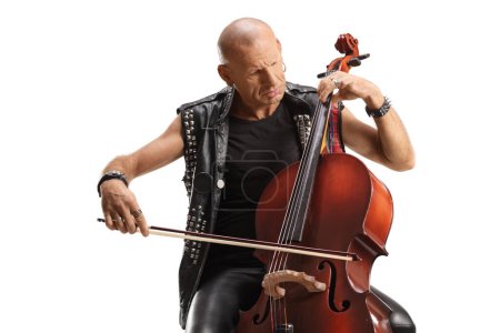 Foto de Bald musician in a leather vest playing a cello isolated on white background - Imagen libre de derechos