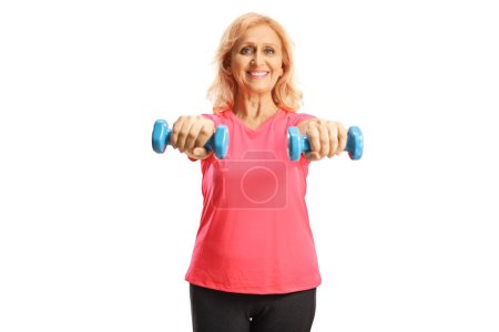 Téléchargez les photos : Smiling woman exercising with dumbbells isolated on white background - en image libre de droit