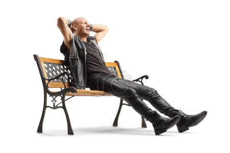 Téléchargez les photos : Relaxed punk sitting on a bench isolated on white background - en image libre de droit