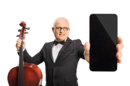 Photo for Musician with a cello instrument showing a smartphone isolated on white background - Royalty Free Image