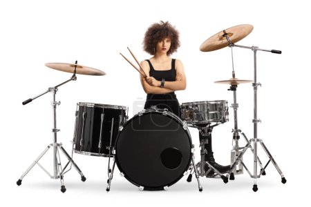 Photo for Female drummer sitting and holding drumsticks isolated on white background - Royalty Free Image