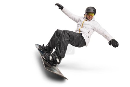 Photo for Full length shot of a man riding a snowboard downhill isolated on white background - Royalty Free Image