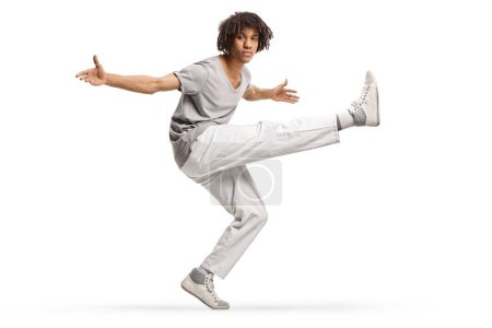 Téléchargez les photos : Afro american male dancer with dreadlocks isolated on white background - en image libre de droit