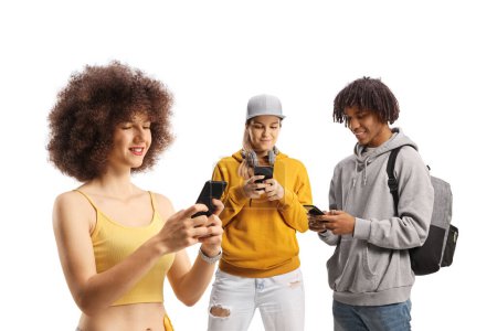 Téléchargez les photos : Group of young people using mobile phones isolated on white background - en image libre de droit