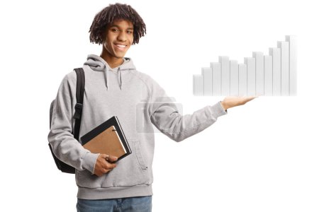 Foto de Estudiante afroamericano sosteniendo libros y un gráfico de barras aislado sobre fondo blanco - Imagen libre de derechos