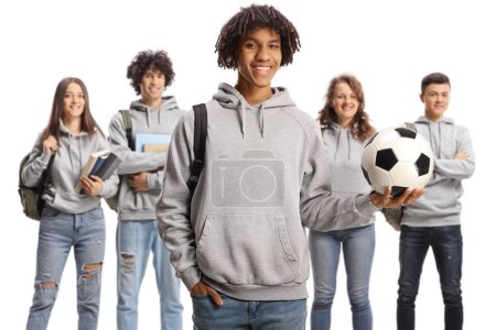 Téléchargez les photos : Group of teenage students with a football isolated on white background - en image libre de droit