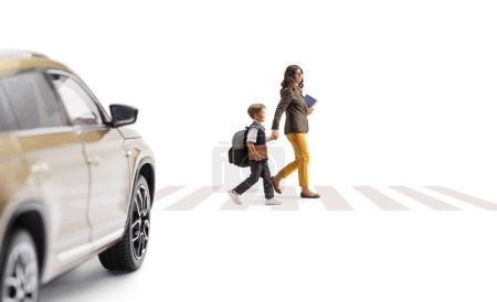 Photo for Schoolboy with a backpack walking over pedestrian crossing and holding hands with his mother isolated on white background - Royalty Free Image