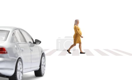 Photo for Car waiting and a pregnant woman walking on a pedestrian corssing isolated on white background - Royalty Free Image