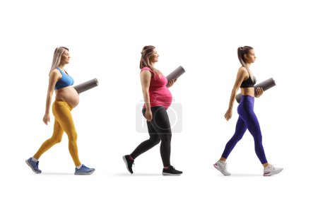 Photo for Aerobic coach walking with two pregnant women isolated on white background - Royalty Free Image