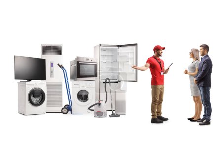 Photo for Appliance sales associate showing electrical appliances to a young man and woman isolated on white background - Royalty Free Image