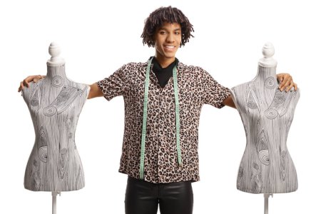 Photo for Young african american fashion designer with doll mannequins isolated on white background - Royalty Free Image