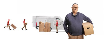 Photo for Workers loading boxes in a van and mature male customer holding a box and looking at camera isolated on white background - Royalty Free Image