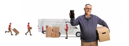 Photo for Workers loading boxes in a van and mature male customer holding a box and showing a smartphone isolated on white background - Royalty Free Image