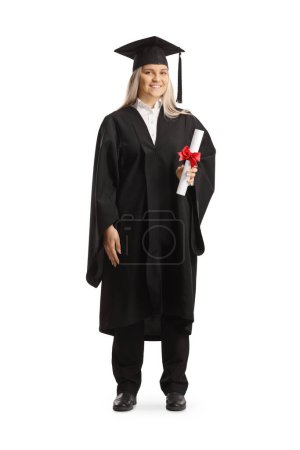 Photo for Full length portrait of a female graduate student holding a certificate isolated on white background - Royalty Free Image