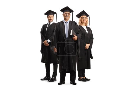Full length portrait of univeristy professors wearing graduation gowns isolated on white background