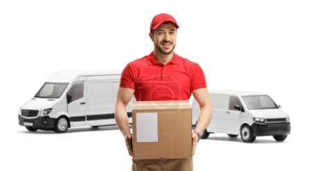 Photo for Delivery man with a transport van holding a cardboard box isolated on white background - Royalty Free Image