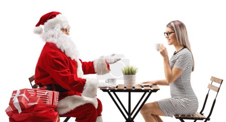 Photo for Santa claus and a young woman having coffee isolated on white background - Royalty Free Image